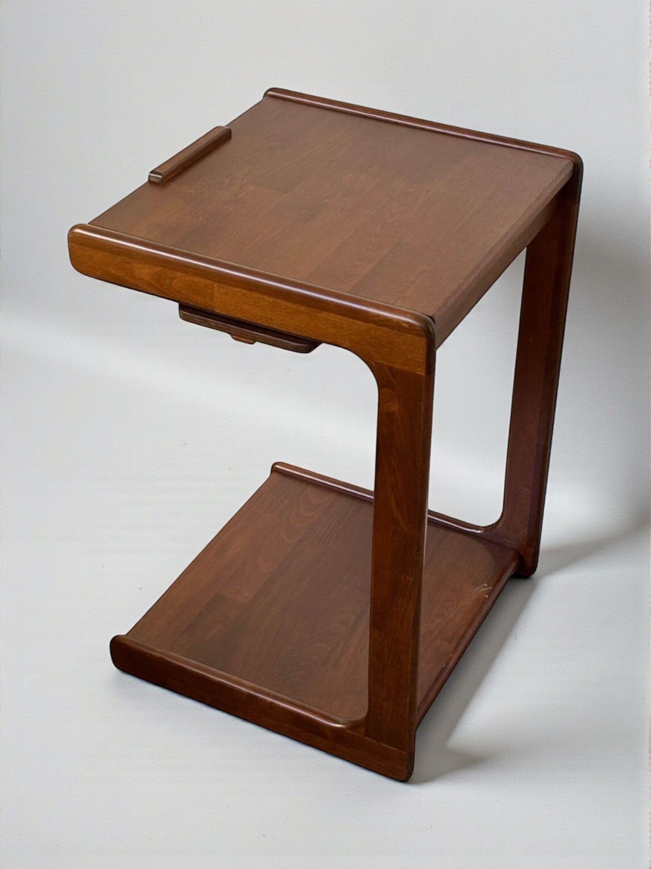 C-shaped side table with wheels, 4-stage extendable mechanism, and phone/tablet stand function.